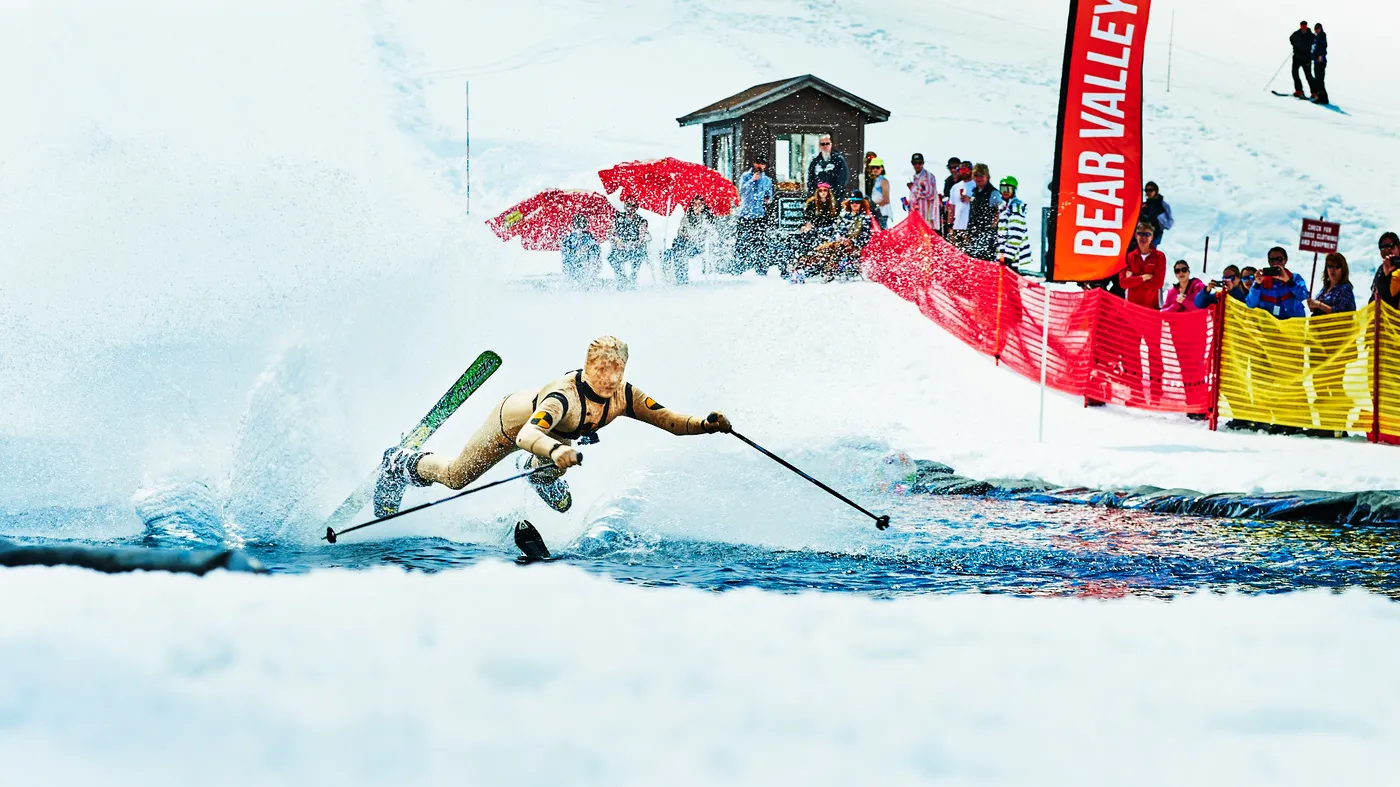 Skier racing a pond-skim course
